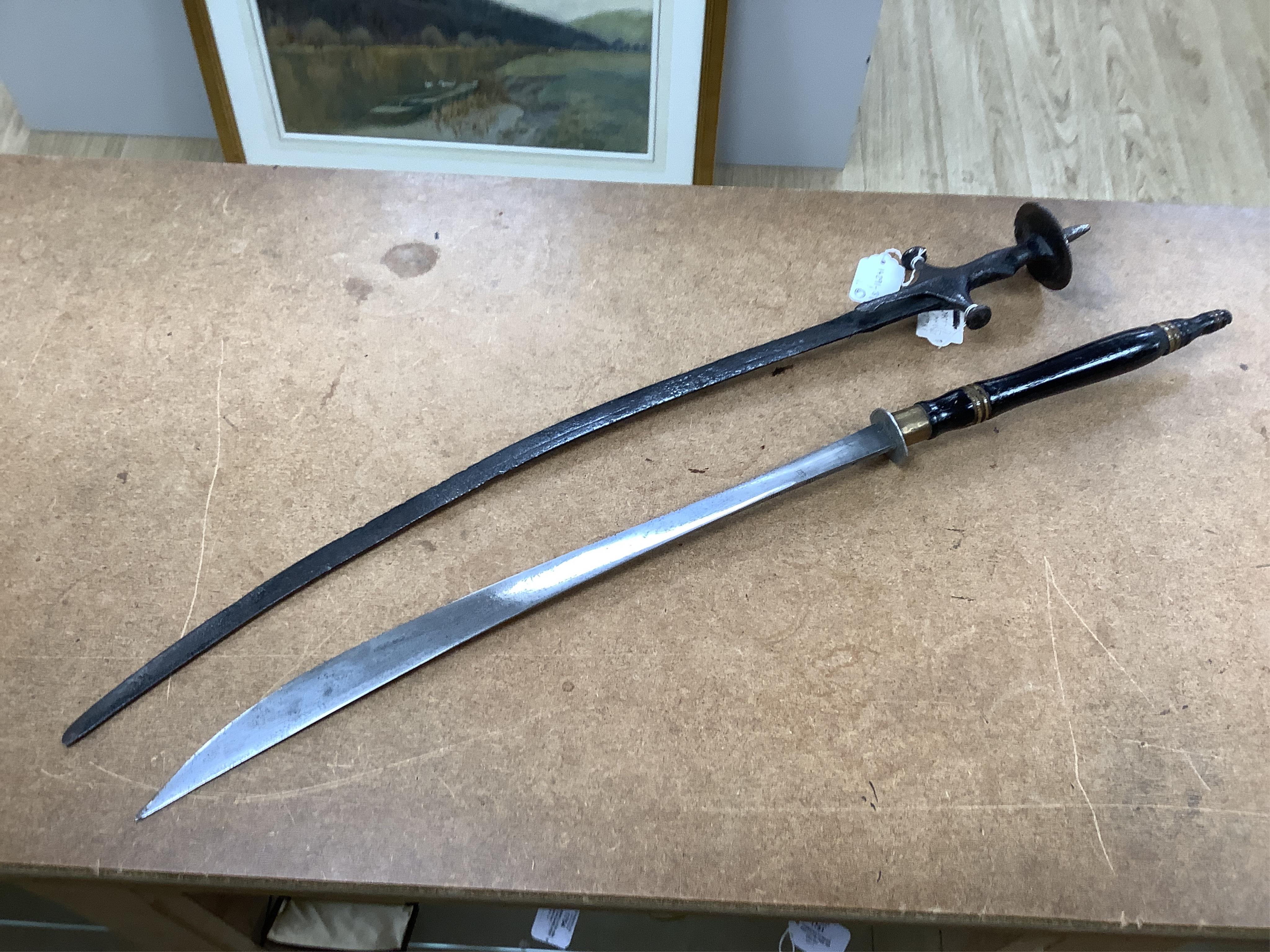 An Indian sword Tulwar, blade 68.5cm. Condition - poor, heavily pitted